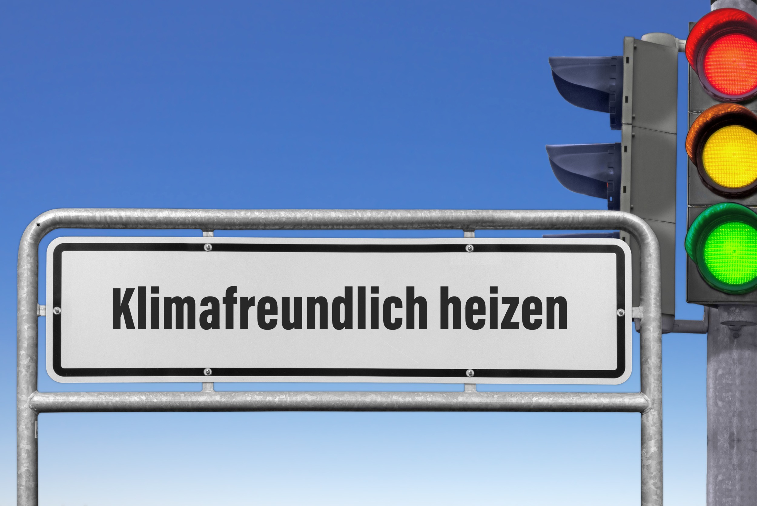 Schild "Klimafreundlich heizen"