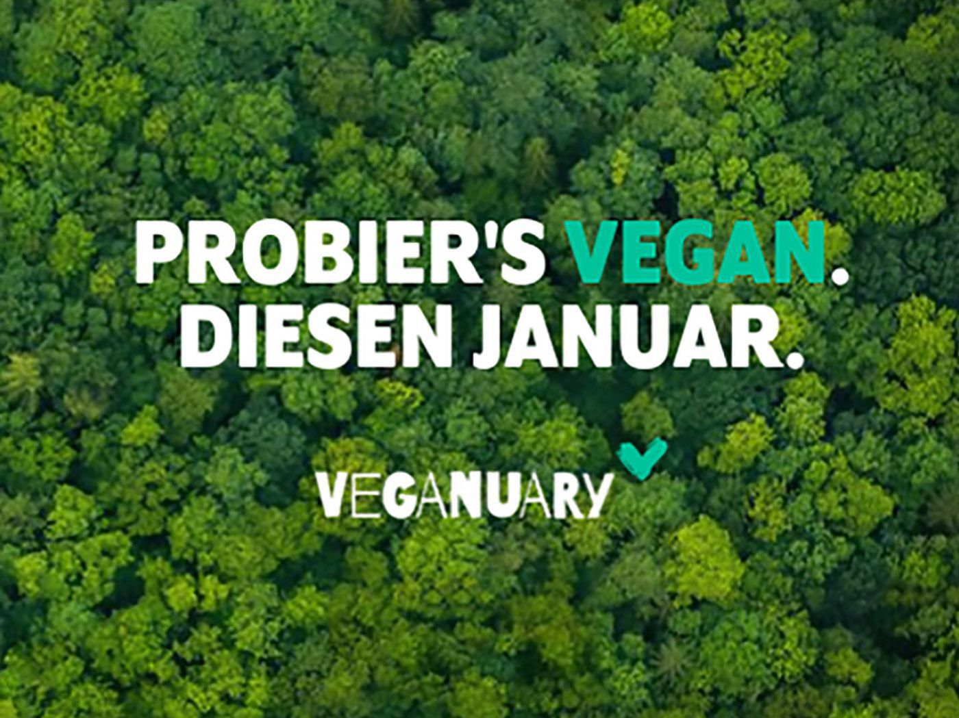 Grüner Regenwald mit Aufschrift "Probiers vegan - diesen Jänner."