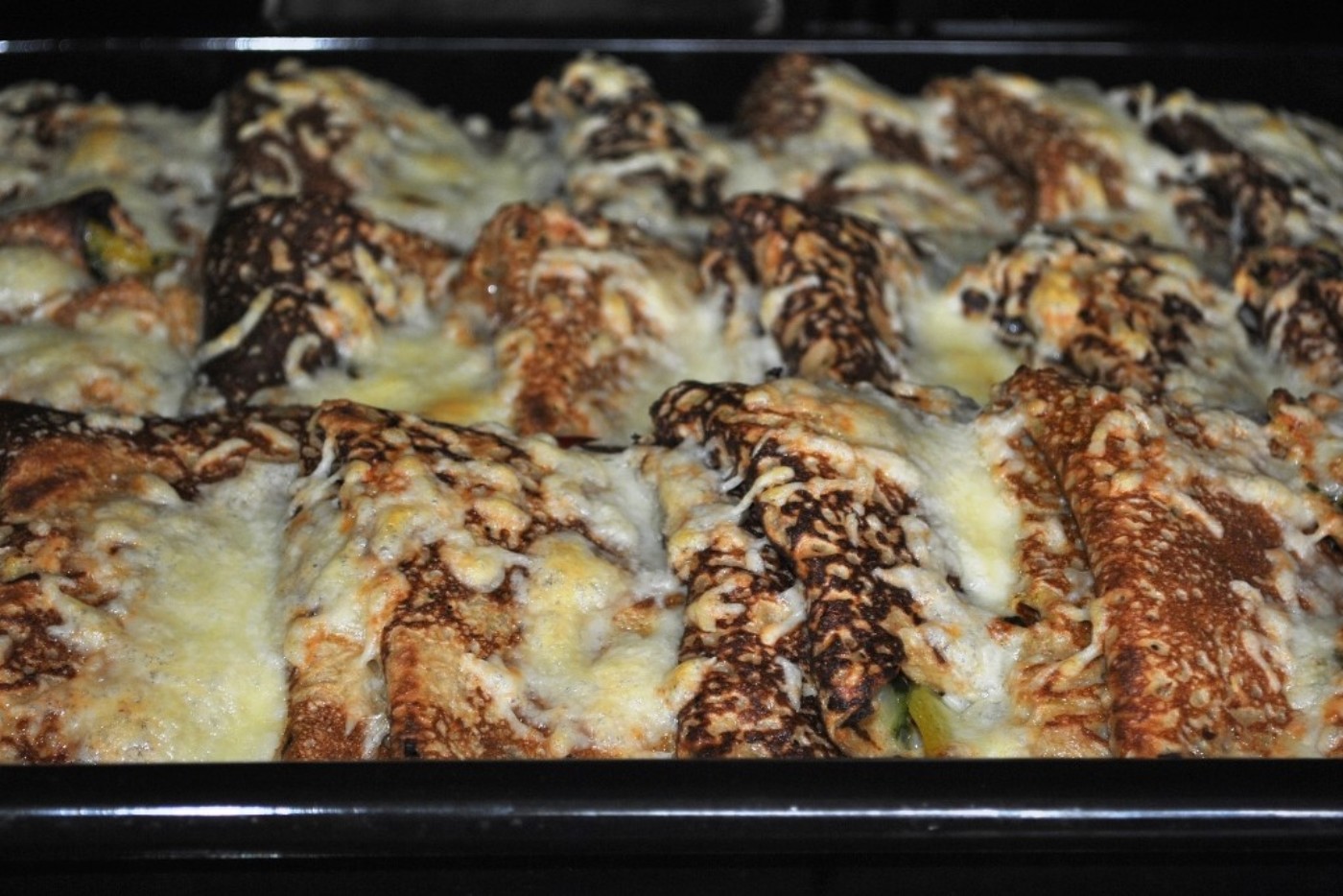 Erdäpfelpalatschinken mit Mangoldfülle